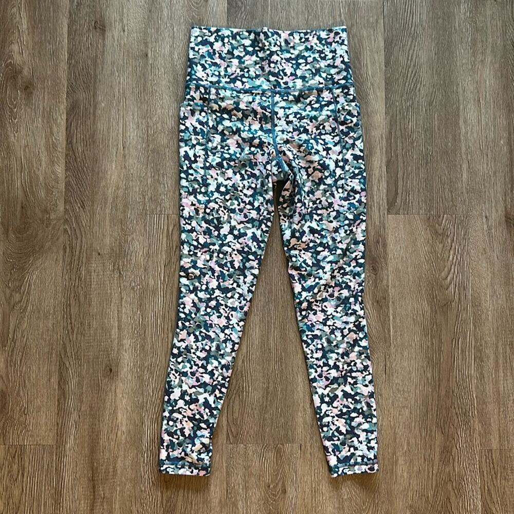 Athleta Salutation Stash‎ Printed Pocket 7/8 Tight Leggings
